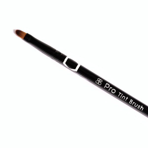 Lash & Brow Pro Tinting Brush, a black angled-tip brush with 'Pro Tint Brush' printed on the handle